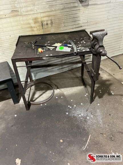 Nice metal bench with vice