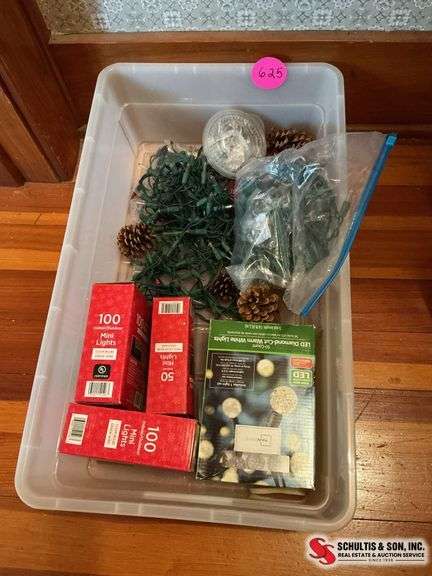packages of mini lights- bag of pinecones-wall hanging- ribbon ￼