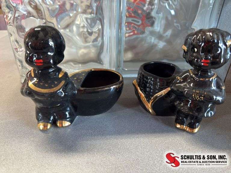 2 dark skin children planters