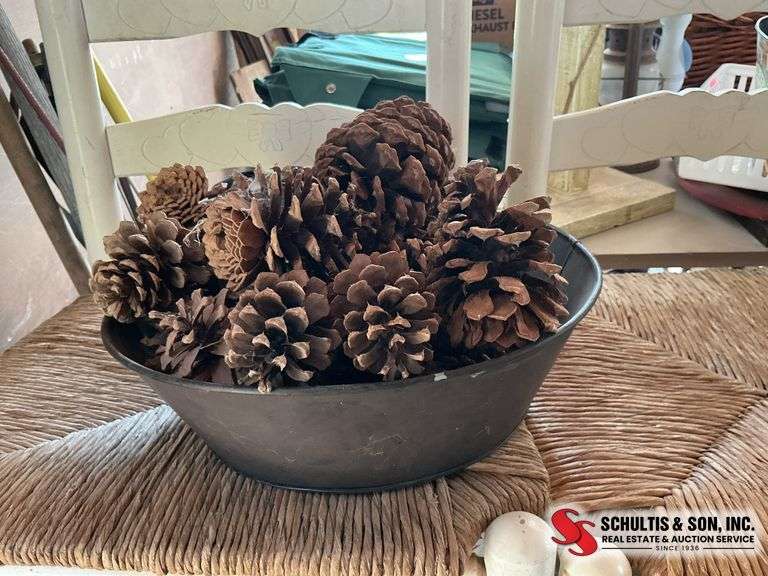 Rustic container with pine cons