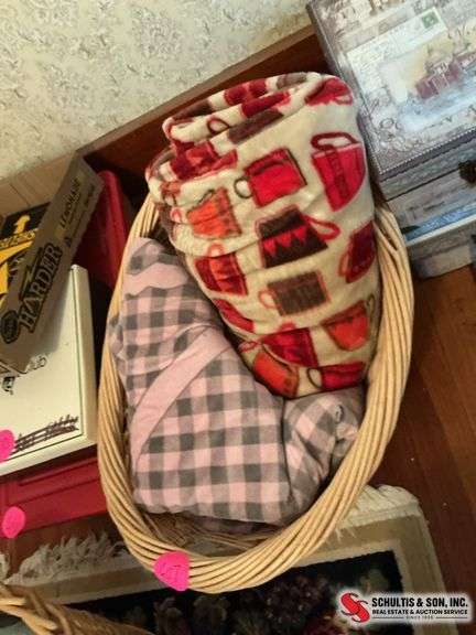 Nice wicker basket with two fleece blankets