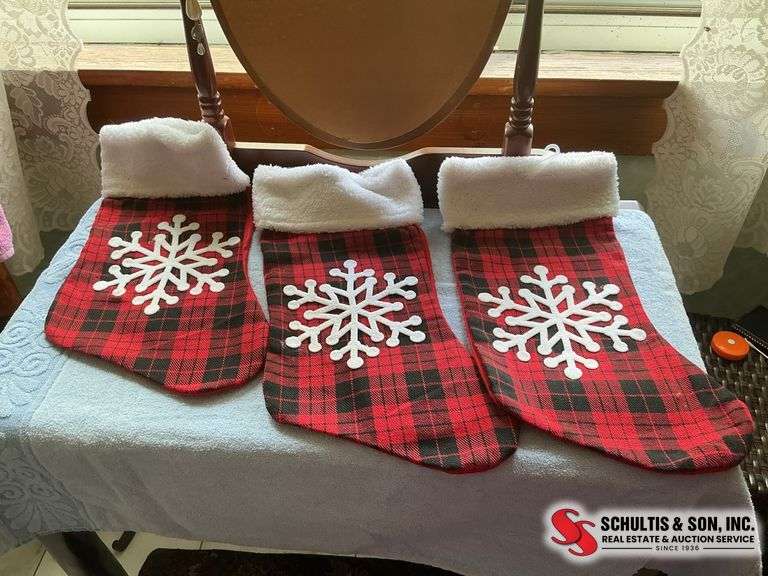 cowboy boot Christmas stockings and red and black plaid Christmas stockings ￼
