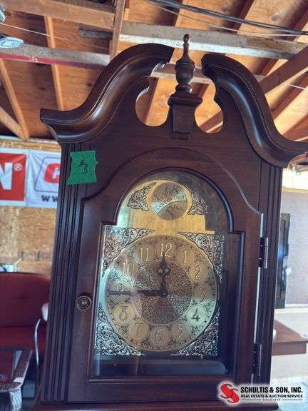 Grandfather clock , weights and pendulum in office