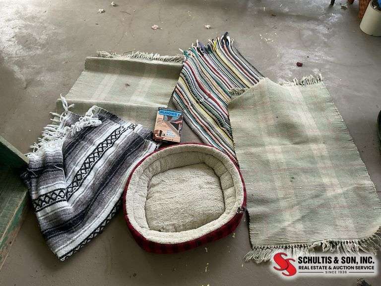 Rugs, small used dog bed, Afghan and Reggie’s