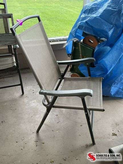 Brown and tan folding chair