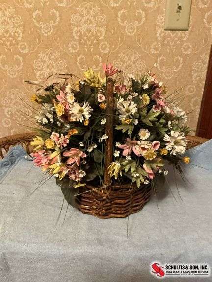 Beautiful floral arrangements in baskets ￼