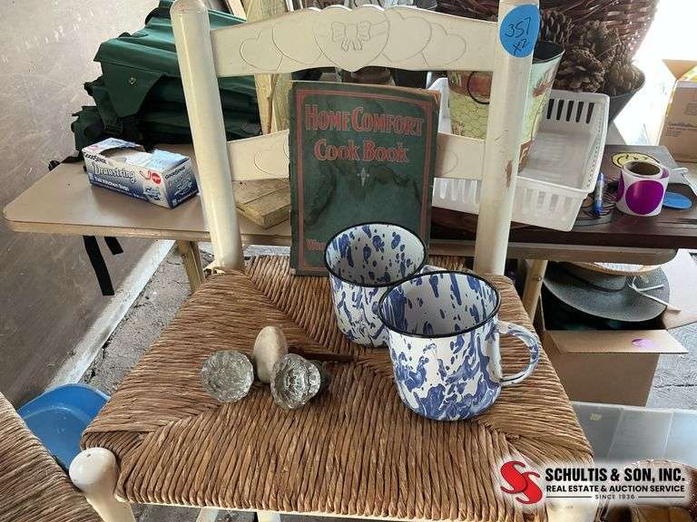 1864 cookbook- 2 enamel coffee mugs- glass knobs, and a porcelain door knob ￼