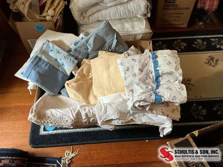 box of pillowcases- sheets and etc. ￼