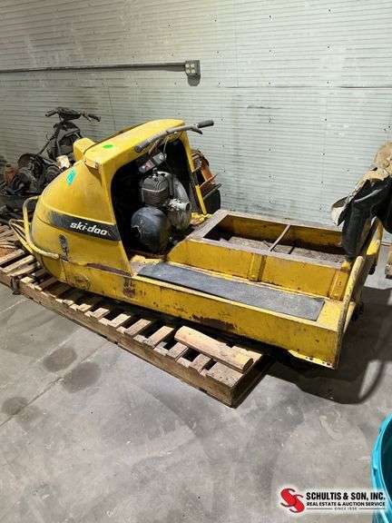 Two old snowmobiles parts or restore