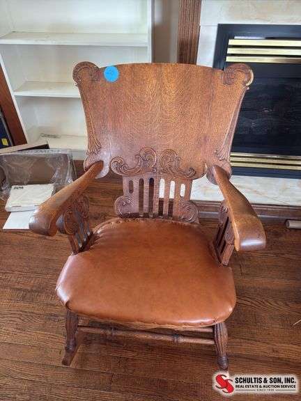 Antique oak padded rocker