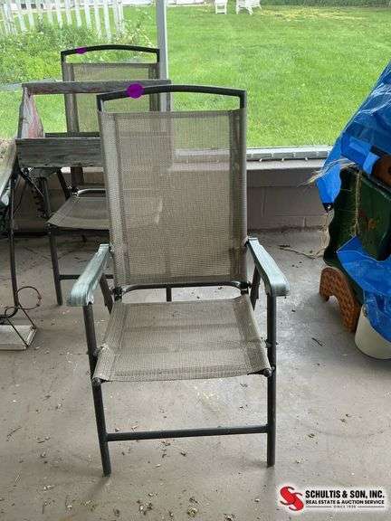 Brown and tan folding chair