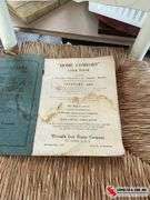 1864 cookbook- 2 enamel coffee mugs- glass knobs, and a porcelain door knob ￼