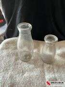 Antique apple peeler & glass milk bottles