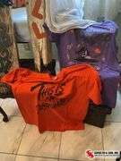 unique Halloween decor made out of wood and two Halloween t-shirts sizes, large and extra large ￼