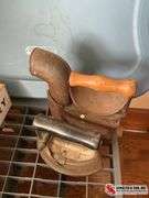 Large sad iron with fuel compartment, and smaller sad iron