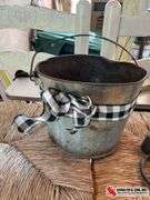 Rusty bucket, and hitching ring