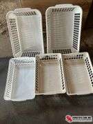 White plastic storage baskets