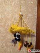 Macrame old baby crib mobile and