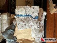 box of pillowcases- sheets and etc. ￼