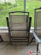 ￼ brown and tan folding chair