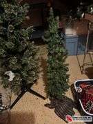 7 foot pre-lit Christmas tree and a 38” Christmas tree with lights on it ￼