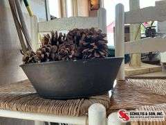 Rustic container with pine cons