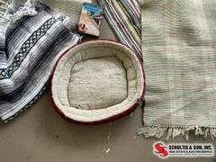 Rugs, small used dog bed, Afghan and Reggie’s