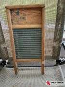 Antique washboard and buck bow saw