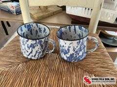 1864 cookbook- 2 enamel coffee mugs- glass knobs, and a porcelain door knob ￼