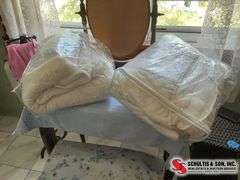2 mattress pad protectors, and a flat sheet for a queen size bed ￼