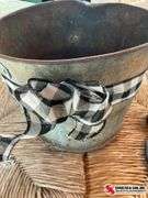 Rusty bucket, and hitching ring