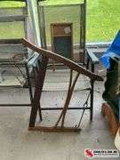 Antique washboard and buck bow saw