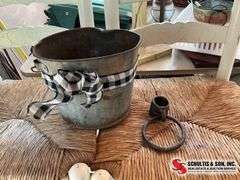 Rusty bucket, and hitching ring