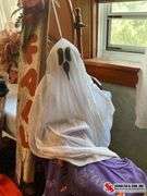 unique Halloween decor made out of wood and two Halloween t-shirts sizes, large and extra large ￼