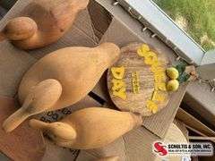 Wooden duck decoys, paddle and lemon cutting board
