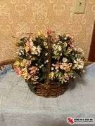 Beautiful floral arrangements in baskets ￼