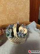 wicker baskets- ceramic baskets- ceramic bunnies- heart shaped ornaments- glittery eggs