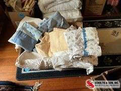 box of pillowcases- sheets and etc. ￼