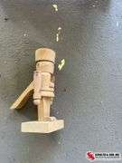 Small wooden nutcracker and small cradle