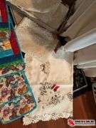 Place mats- dolies- holiday tablecloths- table runners- round table with coverings and glass (20”X 2