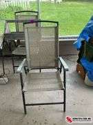 Brown and tan folding chair