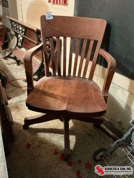Antique desk chair, oak on wheels