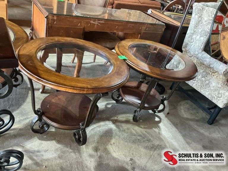 round glass top side table 2 of them (28”X 28” and 24”H )￼