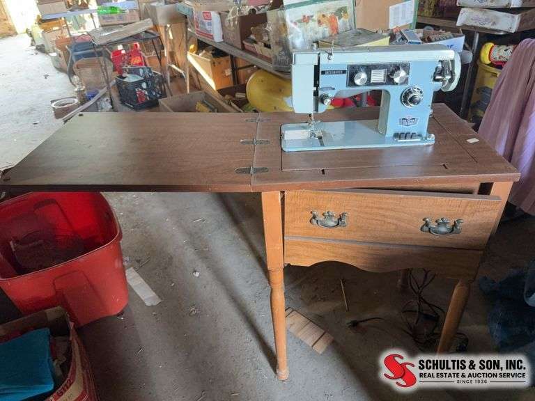 Deluxe, dressmaker, zigzag, sewing machine in cabinet
