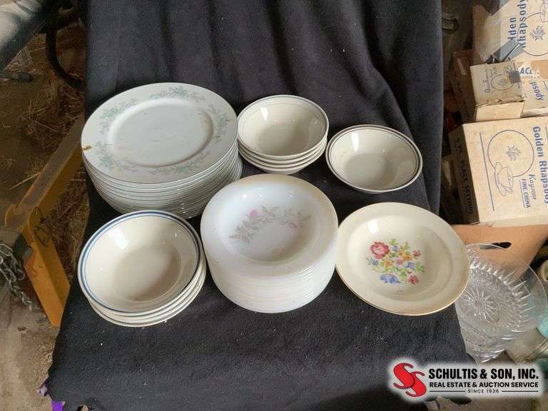 11 Blue Fantasy China plates- 13 Clover Blossom China plates- stoneware ringed bowls- 1 Harker Petit