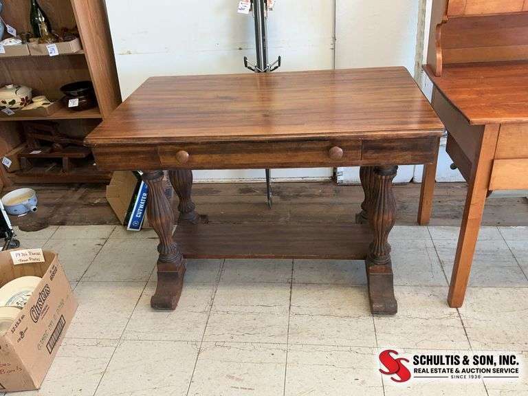 Walnut library table (42.5”W X 26”D X 29”H)