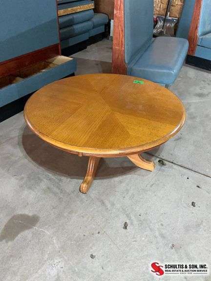 Oak pedestal center table (40” across and 19” high)￼