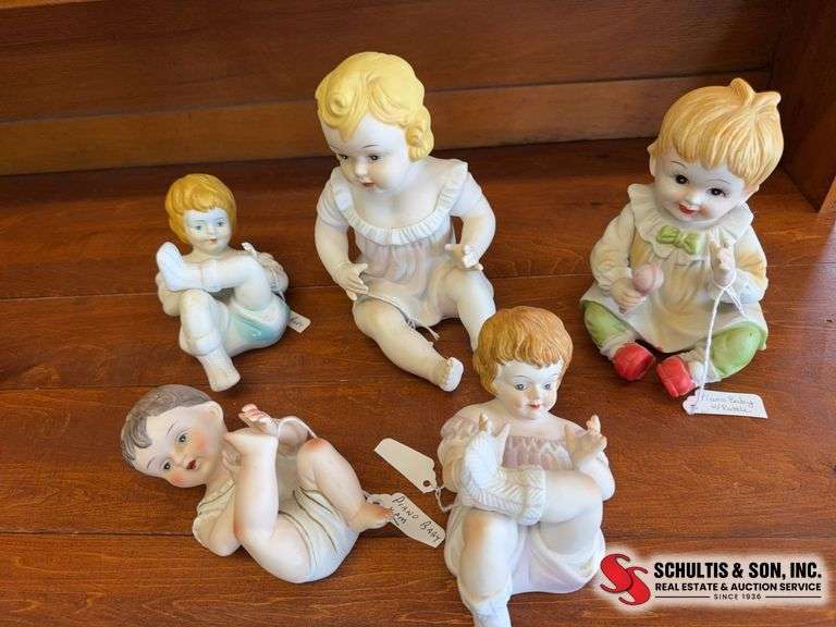 Piano babies statuettes