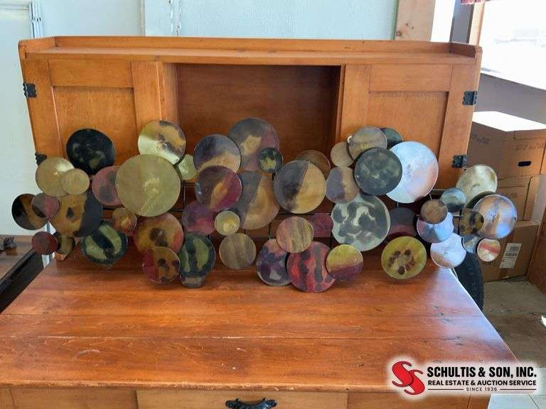 Metal wall sculpture (46” X 17”)