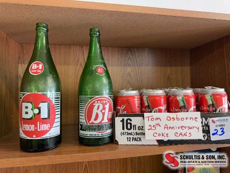 B-1 quart bottles and Tom Osborne coke cans